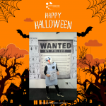 A person in an Olaf costume stands in front of a "Wanted by Police" backdrop, surrounded by Halloween decorations with bats and trees. The design says "Happy Halloween.